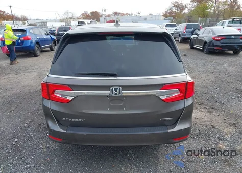 2018 Honda Odyssey Touring z USA, uszkodzony, nr VIN 5FNRL6H8XJB066893